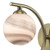 Dar Lighting Atiya Antique Brass Wall Light With Planet Style Glass