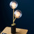 Empathic Lighting Merlin 2 Light Glass Shade Table Lamp With Satin Brass And Matt Black Finish 
