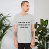 The goal is to be rich. Not to look rich. - Unisex Short Sleeve Jersey T-Shirt Motivational quotes 7810943