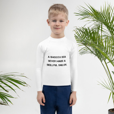 A smooth sea never made a skillful sailor. - Kids Rash Guard Motivational quotes 7812777