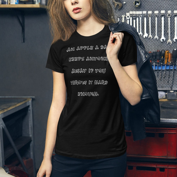 An apple a day keeps anyone away if you throw it hard enough. - Women's The Favorite Tee Funny quotes 7830533