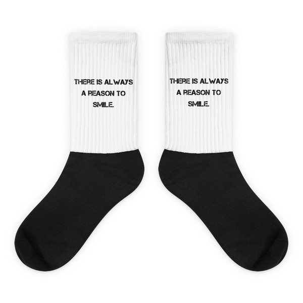 There is always a reason to smile. - Black Foot Socks Motivational quotes 7828556