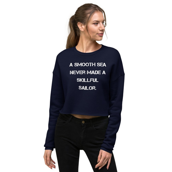 A smooth sea never made a skillful sailor. - Women's Fleece Crop Sweatshirt Motivational quotes 7835980