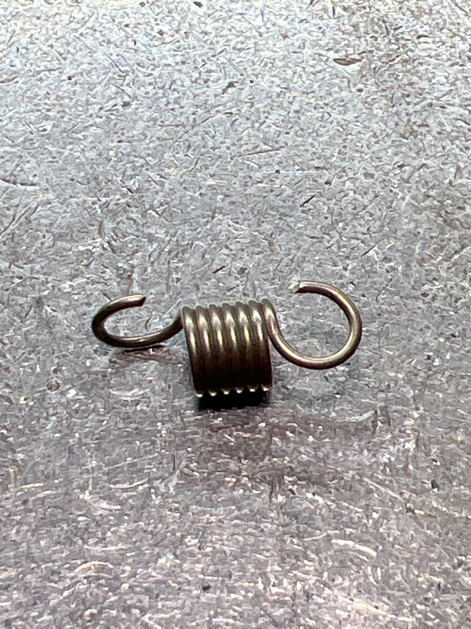 10NRQ CLICK PAWL SPRING (TGT0630
