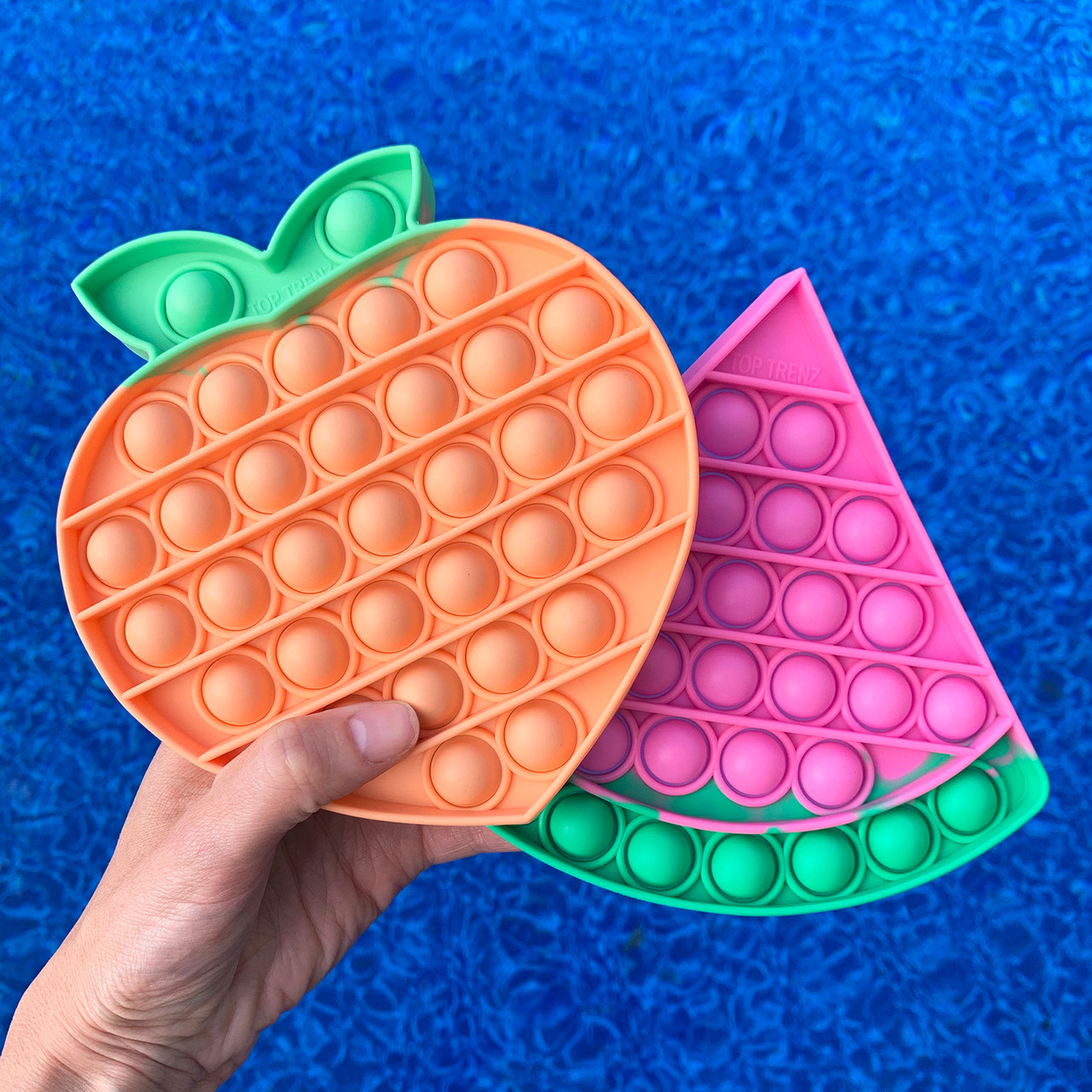 pop Fidget toys its shaped like a PEACH FIDGET