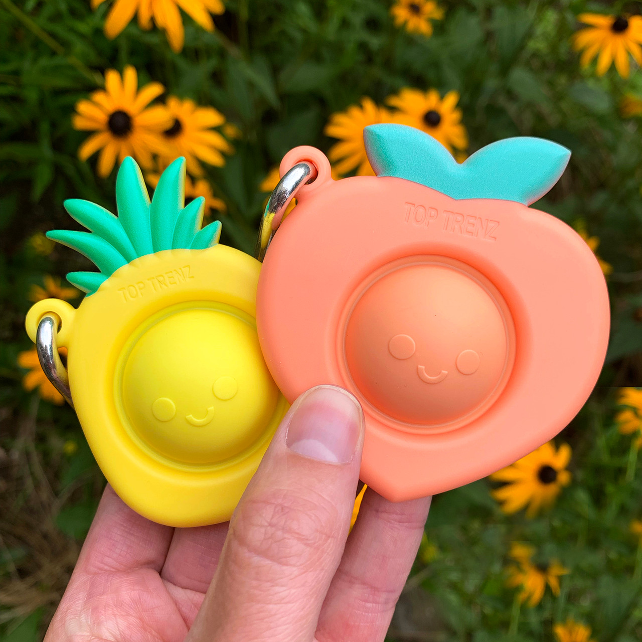 Peach fidget toy keychain.