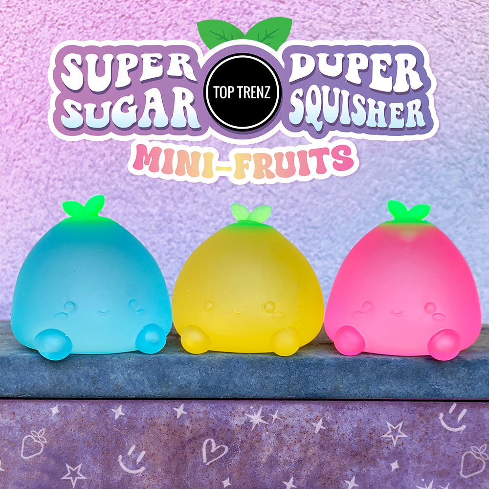 The Sugar Squisher Mini Fruits 2-Pack arranged in a playful setting, featuring the strawberry and pineapple squishy toys, highlighting their cute and collectible nature