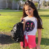 model holding up a top trenz miniature puffer design backpack