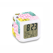 top trenz trippy waved pastel colored print with "peace love smile" printed on this room digital clock