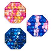 Colorful tie-dye octagon-shaped pop it fidget toy with a mix of vibrant colors including blue, black, yellow, and pink, featuring bubble-like buttons arranged symmetrically for sensory fun