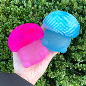 Pink and Blue Super Duper Sugar Squishier Mushrooms in models hand