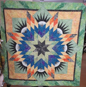 Paper-Pieced Batik Lonestar Quilt