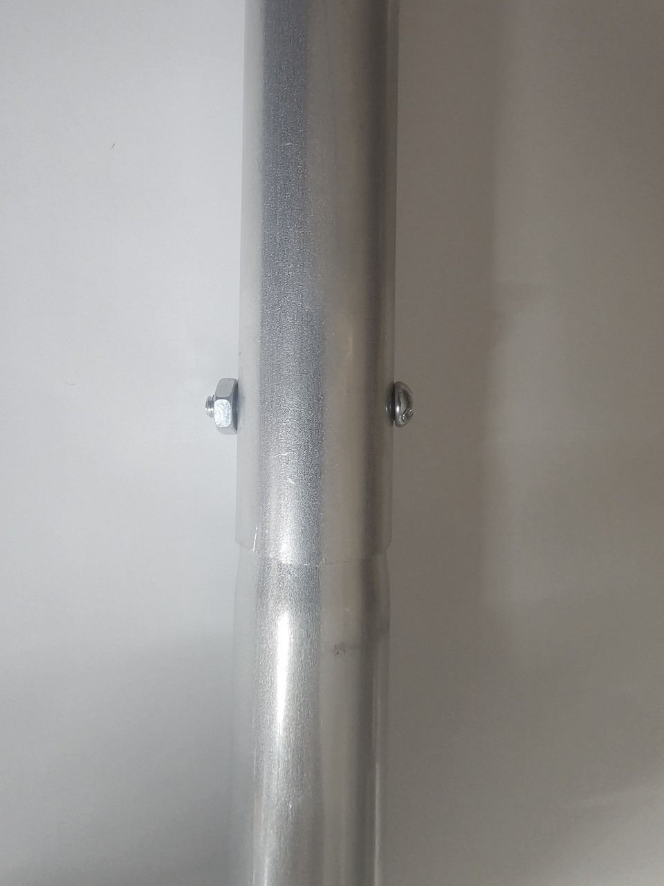 Poles longer than 48 inches will have an easy to install and remove nut and bolt to securely fasten the poles together.