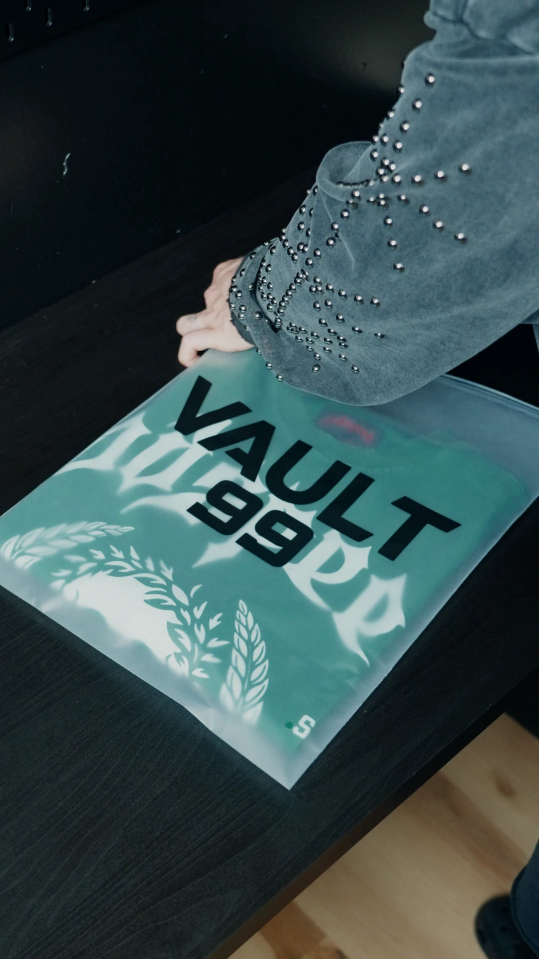 An order being packed in a Vault 99 branded garment bag