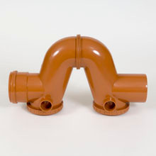 PVC RIOOL S-SIFON 125MM  RDBR + 2 ONTSTOPPINGEN