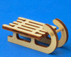 Wooden German Figurine Two Tone Sled – alternate view of the Christmas ornament