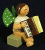 WENDT & KÜHN Brunette Angel Accordion Figurine Sitting – Christmas Figurine