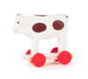 Wooden German Figurine Cow on Wheels – Christmas ornament by Volker & Heiko Flath