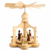 A beautifully handcrafted German Christmas pyramid featuring a traditional Nativity scene with turned wooden figures. Made from natural wood and powered by pyramid candles for a timeless holiday display.
