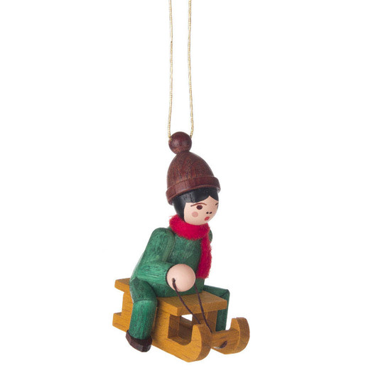 Holiday Sports Children German Ornament Sitting on Sled – Christmas ornament