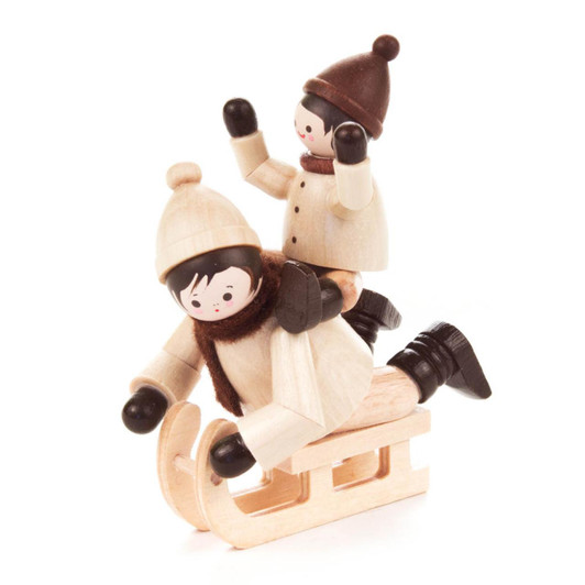Children Riding a Sled German Wooden Figurine – Christmas ornament by Romy Thiel