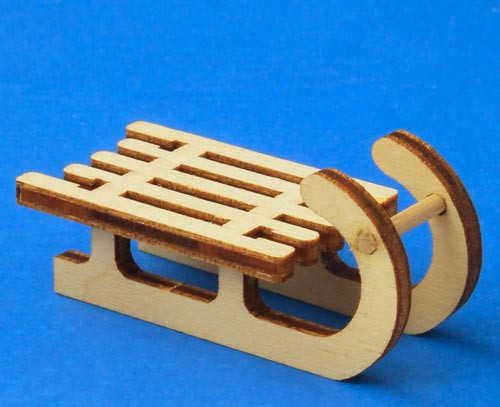 Wooden German Figurine Two Tone Sled – alternate view of the Christmas ornament
