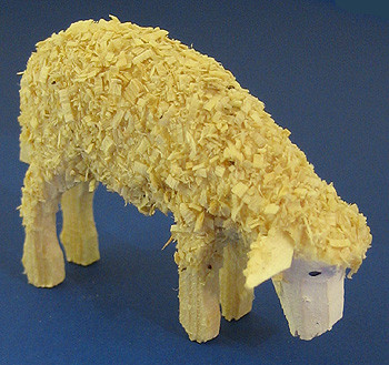 Sheep Figurine Bending 30x45mm – alternate view of the Christmas ornament