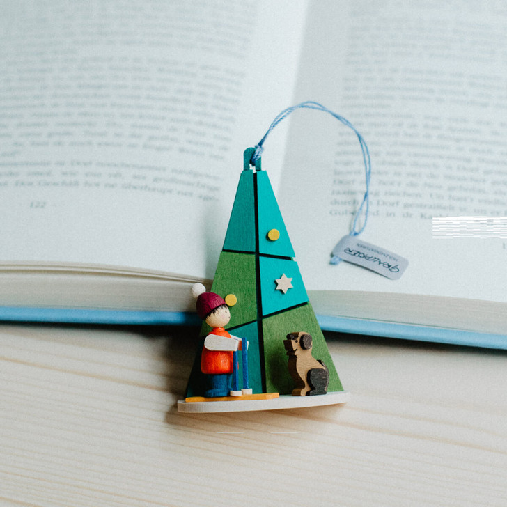 Child with Dog - Tree Shaped Wooden Ornament – detail view of the Christmas ornament