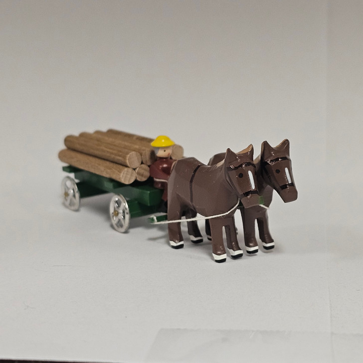 Horses Pulling Green Timber Wagon - Wooden German Figurine – side view of the Christmas ornament