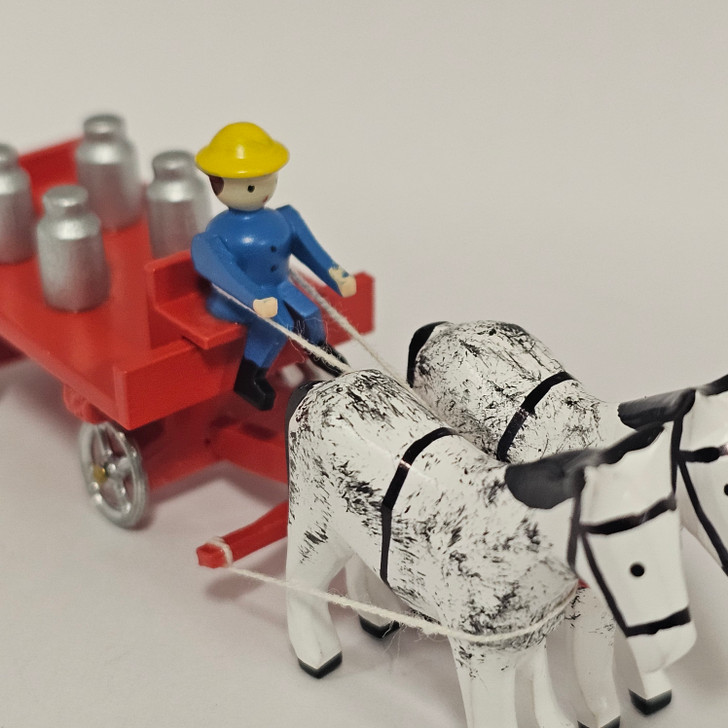 Horses Pulling Red Wagon Carrying Milk Cans - Wooden German Figurine – detail view of the Christmas ornament