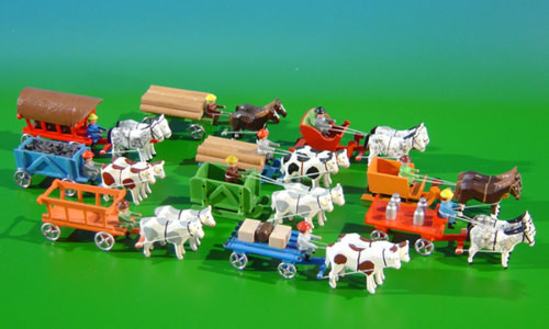 Horses Pulling Red Sleigh - Wooden German Figurine – alternate view of the Christmas ornament