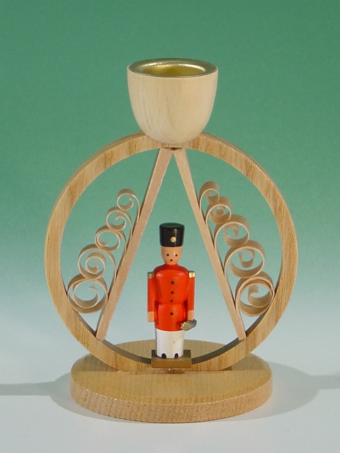 Red Nutcracker Under A Shaved Tree Candleholder – alternate view of the German nutcracker