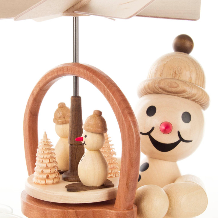Junior Snowman holding a Pyramid - Tealight Pyramid | 7.8 Inches – detail view of the German Christmas smoker