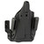 Side angle view showing magnetic retention and tuckable belt clips on MFT holster