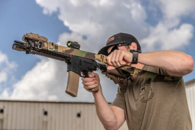 Blue Force Gear Vickers Combat Sling Woodland Camo rapid adjuster detail in use