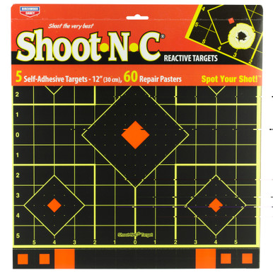 Birchwood Casey Shoot-N-C target showing bullet impact burst rings