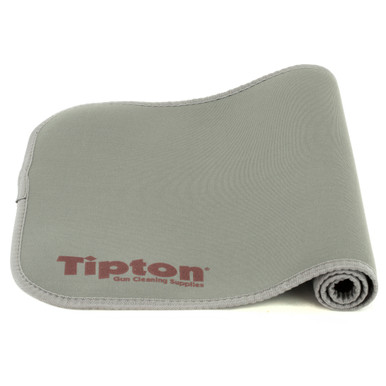 Tipton 12x24 Neoprene Firearm Cleaning and Maintenance Mat rolled out on workbench
