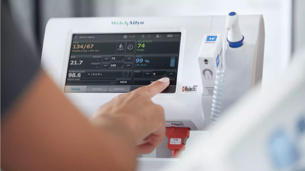 Baxter Welch Allyn 74ME-B Connex Spot Monitor with SureBP Non-invasive Blood Pressure, Masimo SpO2, Braun ThermoScan PRO 6000 Ear Thermometer in use