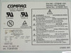 Compaq PS-5201-4C label showing part no. 270646-001, spare no. 270656-001, input/output specs, and model PS-5201-4C