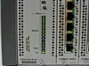 HP J4121A ProCurve Switch Engine Module slot and J4111A 10/100Base-T Module close-up showing status LEDs and port labels A through J