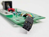 Close-up of multi-pin ribbon cable header connector on Guzik C201 Calibrator board