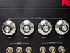 Close-up of Time Functions section showing Train, Degas t, Bursts, and Quiet t knobs with Scope and Outputs BNC connector rows below