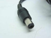 HP C2175A barrel plug output connector close-up showing center-positive tip