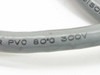NCR Comten cable jacket close-up showing PVC 80°C 300V voltage and temperature rating printed on jacket