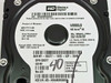 Western Digital WD800JD label close-up showing model WD800JD-75MSA1, 80GB, 7200RPM, SATA, Dell DC077, date 20 Feb 2006, firmware A1, Product of Malaysia