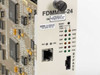 Cabletron FDMMIM-24 front panel mid-section – PST/LNK indicators, RJ-45 Ethernet port, BYPASS switch, and full LED array (XMT, RCV, WRP, ROP, SOK, CLN, POK)