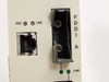 Cabletron FDMMIM-24 FDDI A port close-up – cracked and broken MIC fiber connector housing, adjacent RJ-45 port, PST/LNK LEDs