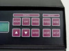 Close-up of Bunyar-Malenfant 112 STC front panel keypad — Traffic group (Hour, Day, Week) and Report group (Period, Send) buttons plus navigation and Set Up keys
