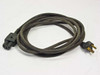 IEC C15 power cord 8943W full length coiled view — alternate angle showing both NEMA 5-15P and C15 ends