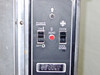 US Range CG-100 upper control panel showing Power ON/OFF switch, Heat indicator with red pilot light, Cook/Cool Down switch, interior light button, and digital display